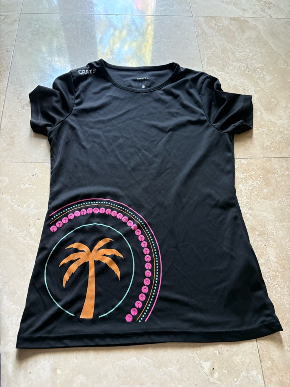 Craft Black Short-Sleeve Active Tee with Orange Palm and Pink & Teal Accents